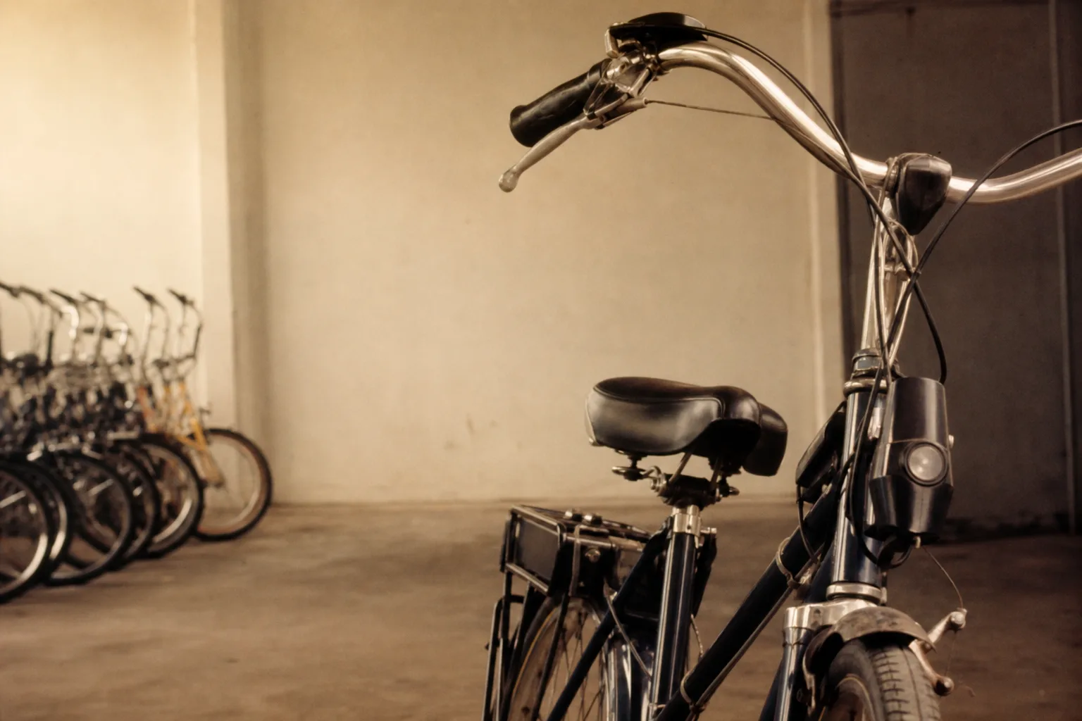 Upright bars, wide saddle, forty extra pounds. What that trade actually costs you
